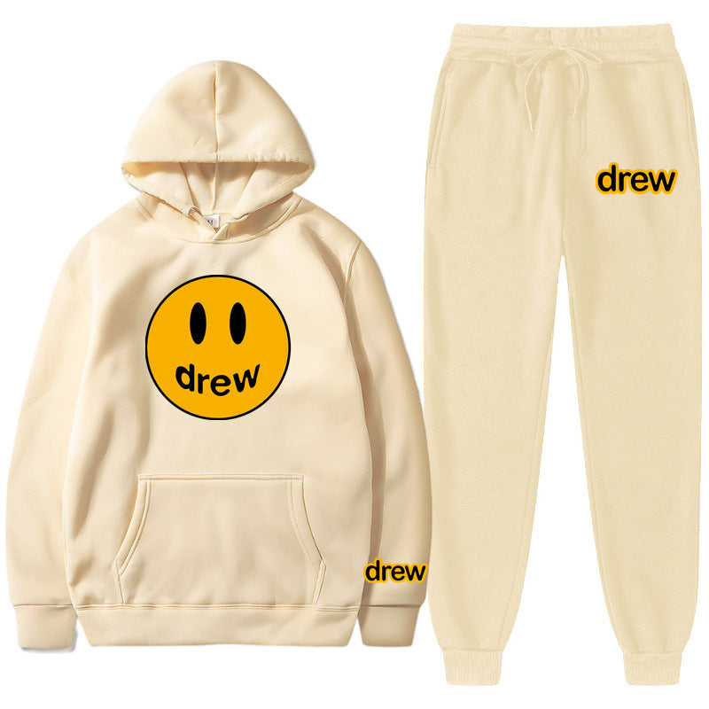Unisex nan zweiteiliges Lounge-Set aus French-Terry mit Smiley-Print Kapuzenpullover und tapered Jogginghose EB