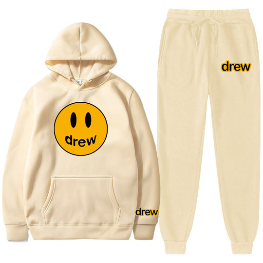 Unisex nan zweiteiliges Lounge-Set aus French-Terry mit Smiley-Print Kapuzenpullover und tapered Jogginghose EB