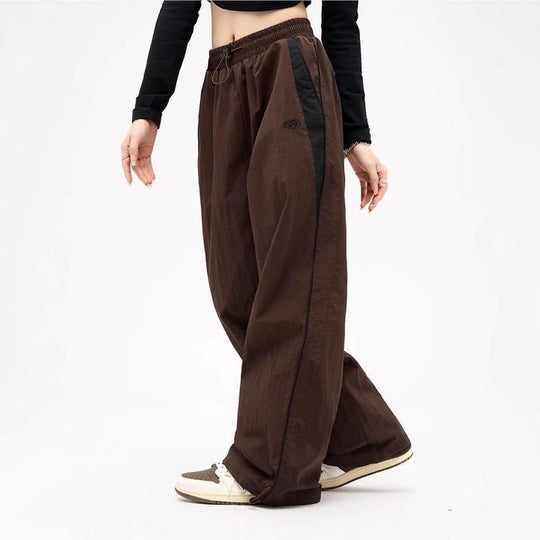 Damen nan weite Trackhose mit Kontrastpaspel, elastischem Bund und Oversize-Schnitt EB