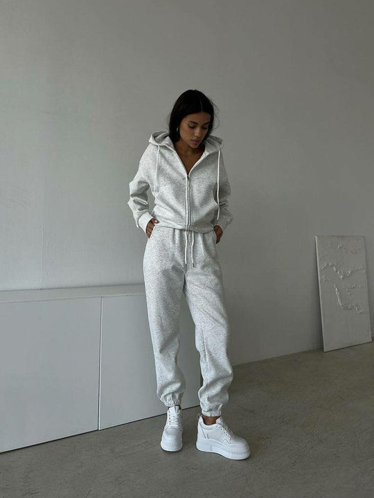 Damen lässiges Kapuzen-Sweatshirt und Jogginghose Set in Oversize-Passform mit Reißverschluss und Kängurutasche Eichborn Berlin