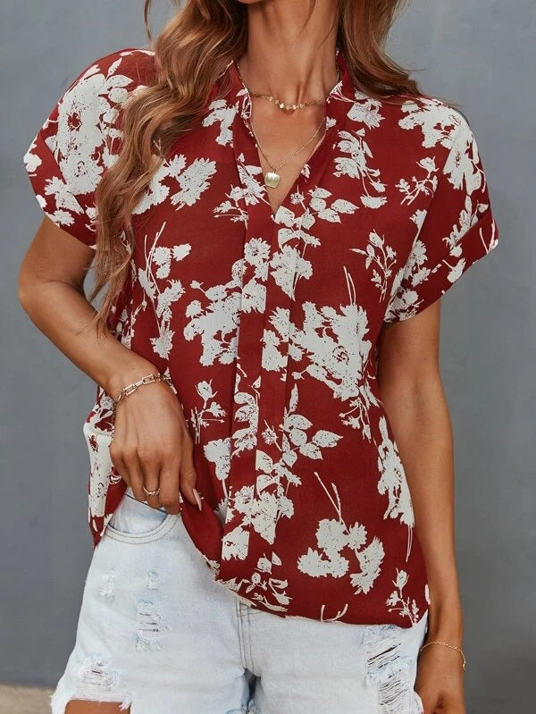 Damen lässige Bluse mit floralem Muster und kurzer Knopfleiste EB