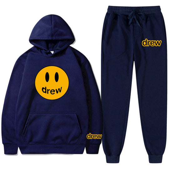 Unisex nan zweiteiliges Lounge-Set aus French-Terry mit Smiley-Print Kapuzenpullover und tapered Jogginghose EB