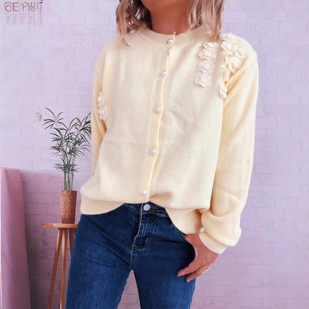 Damen Strickjacke mit floralem Design und eleganten Perlenknöpfen EB
