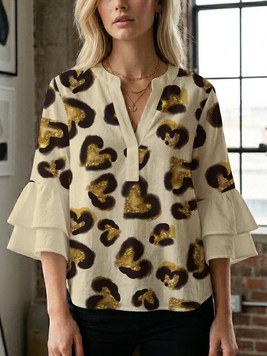 Damen Bluse mit voluminösen Rüschenärmeln und modernem Motiv EB