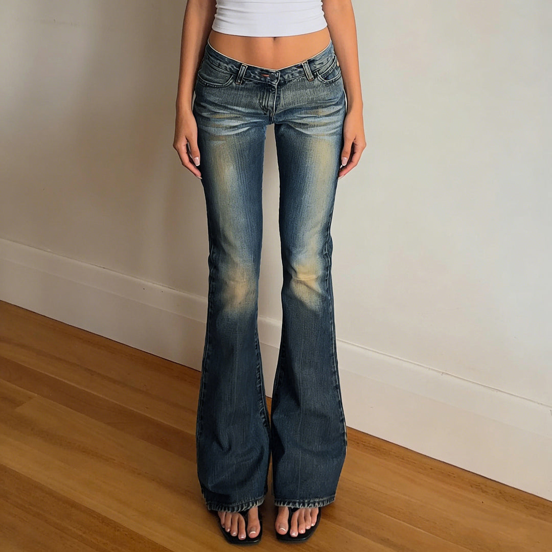 Damen Flared Jeans mit hohem Bund und schickem Used-Look EB