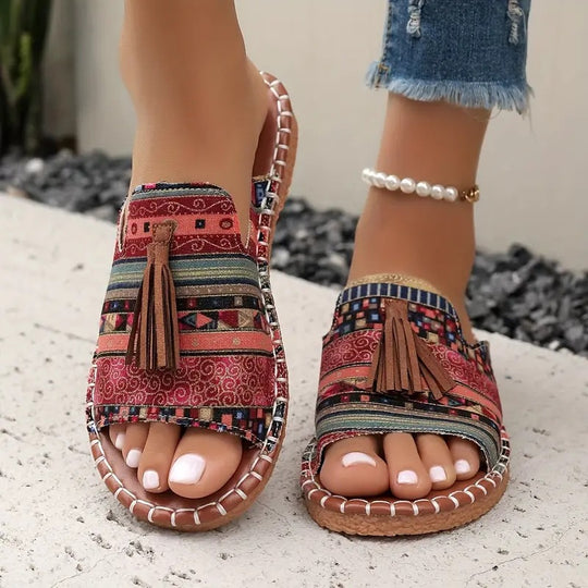 Damen Ethno-Slipper-Sandalen mit Quaste und handgenähter Ziernaht EB