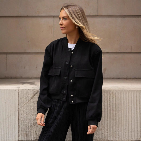 Damen lässige Kunstlederjacke mit praktischen Taschen und elastischen Bündchen EB