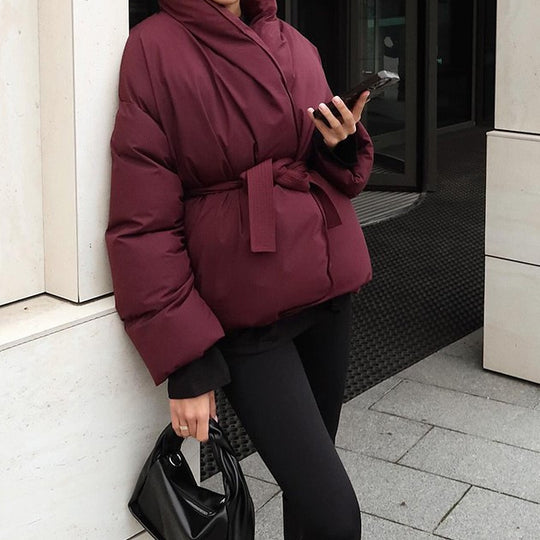 Damen Oversized Steppjacke mit Gürtel und hohem Kragen EB