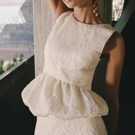 Damen elegantes Oberteil mit ausgestelltem Saum und strukturiertem Material EB