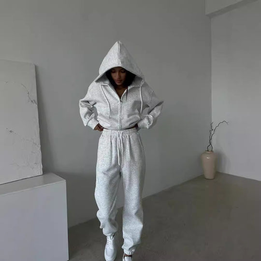 Damen lässiges Kapuzen-Sweatshirt und Jogginghose Set in Oversize-Passform mit Reißverschluss und Kängurutasche Eichborn Berlin