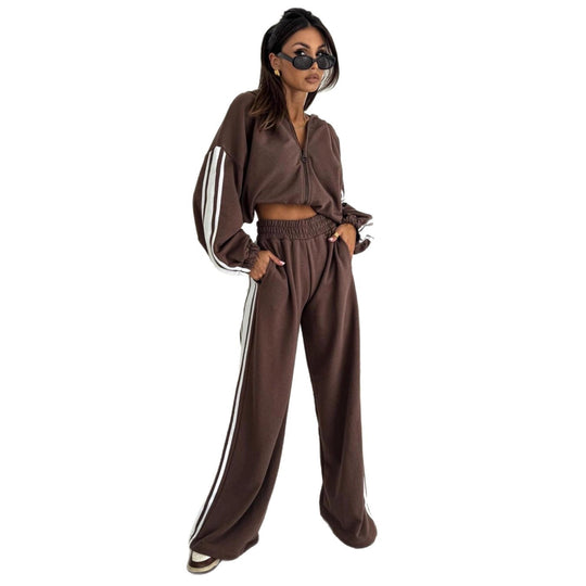 Damen cropped Zip-Hoodie mit voluminösen Ballonärmeln und High-Waist Relaxhose im sportlichen Seitenstreifen-Design Eichborn Berlin