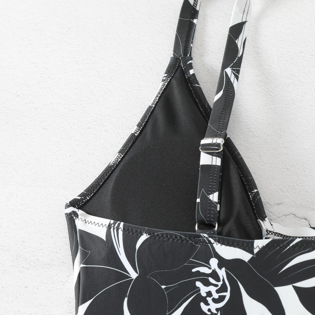 Damen Einteiler Badeanzug mit elegantem floralem Design und modernem V-Ausschnitt EB