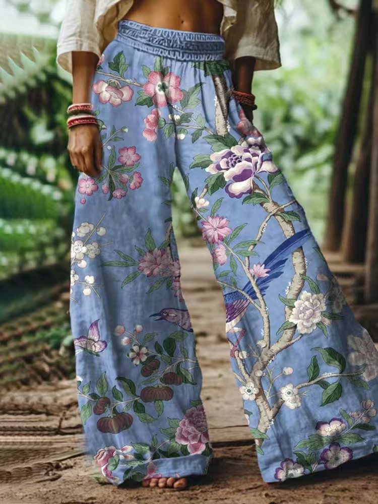 Damen Weite Sommerhose mit buntem Blumen- und Schmetterlingsprint EB