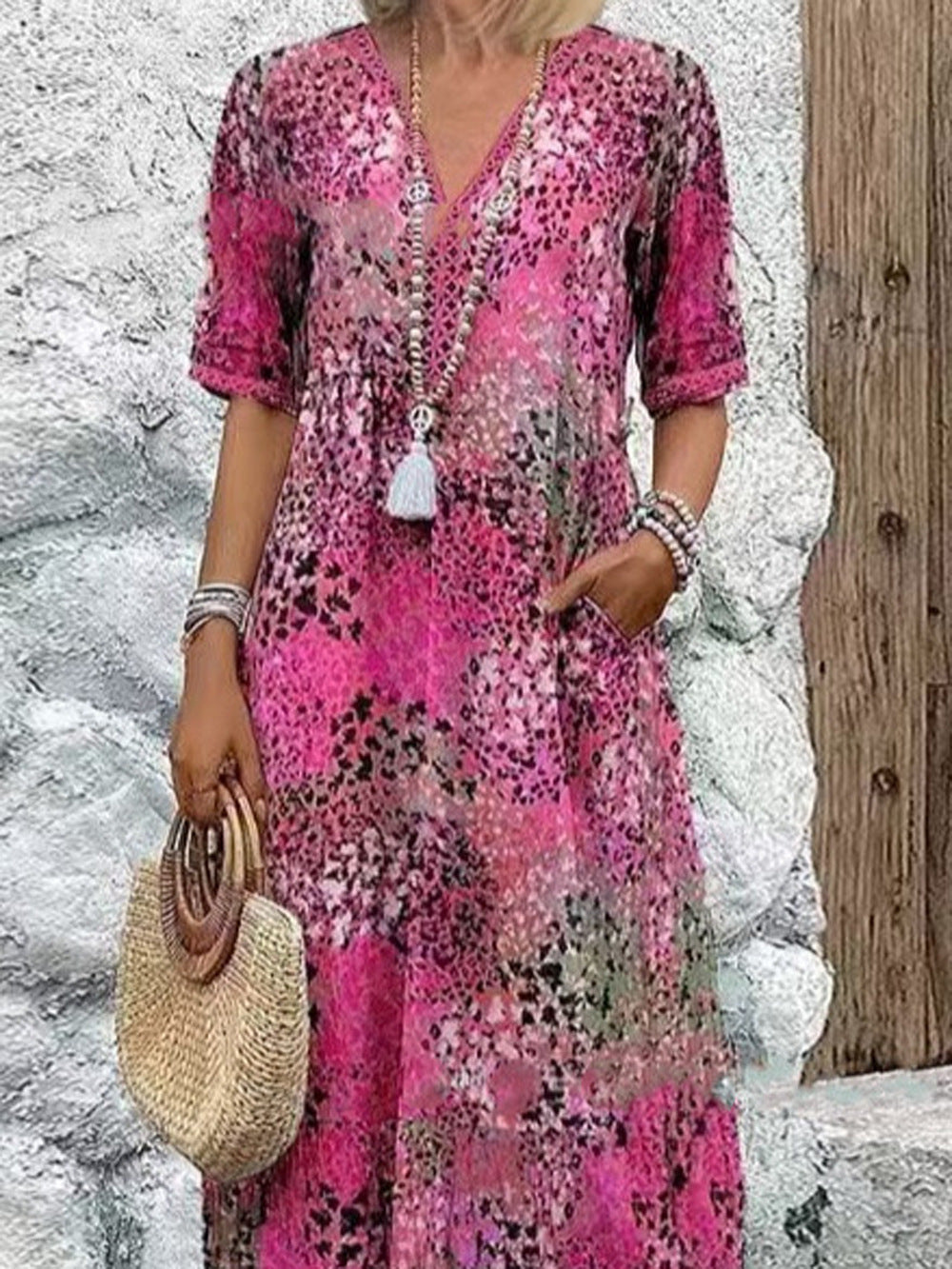 Damen Maxikleid mit V-Ausschnitt und praktischen Seitentaschen EB
