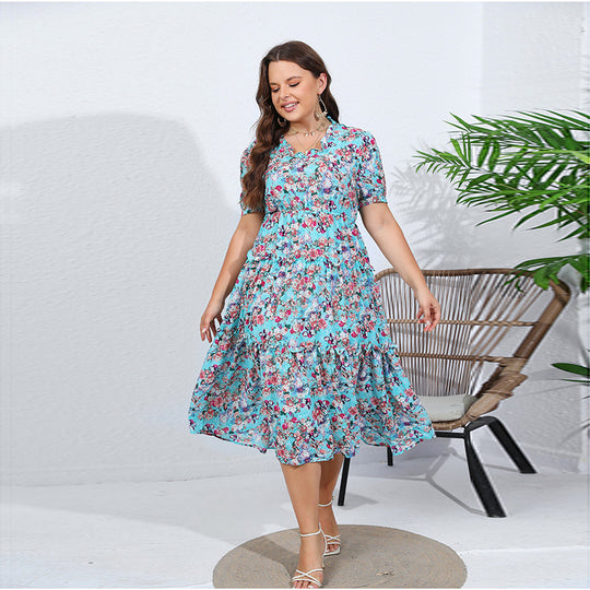 Damen Midikleid mit verspieltem Blütenmuster und voluminösem Rock EB