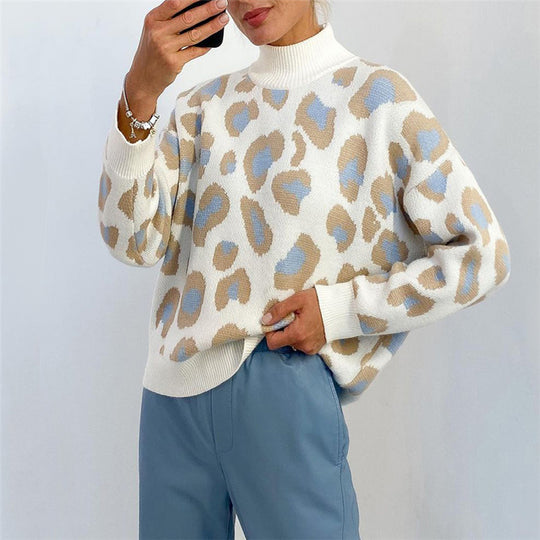 Damen Oversize Rollkragenpullover mit Leo-Jacquard und Rippbündchen EB