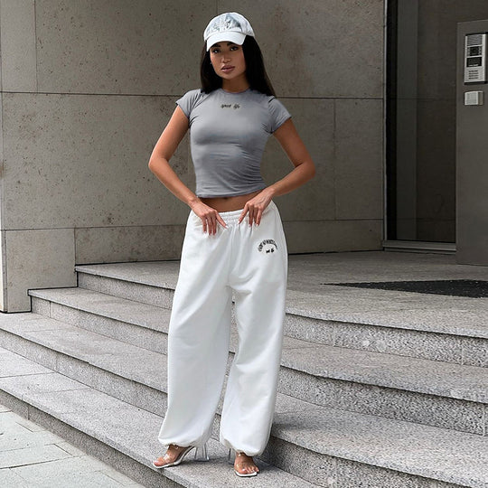 Damen Sportliches Set mit Figurbetontem Oberteil und weitem Hosen EB