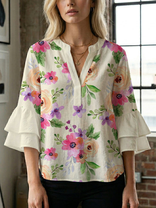 Damen Bluse mit voluminösen Ärmeln und floralem Design EB