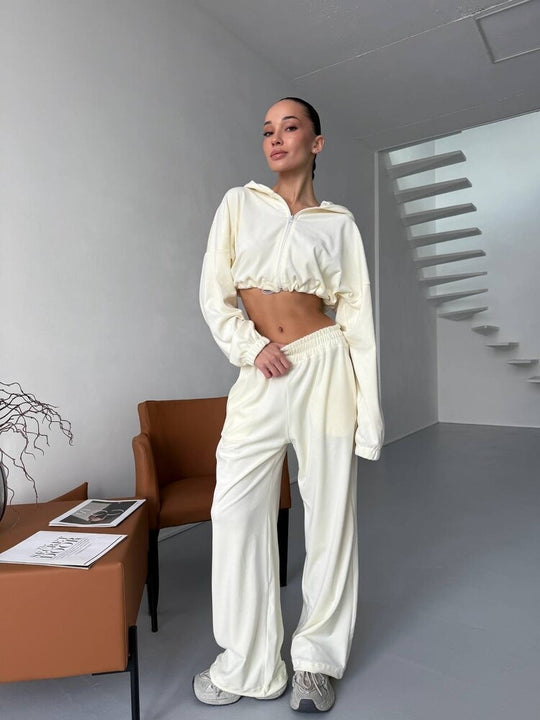 Damen cropped Zip-Hoodie mit elastischem Saum und locker fallende Palazzo-Jogginghose Eichborn Berlin