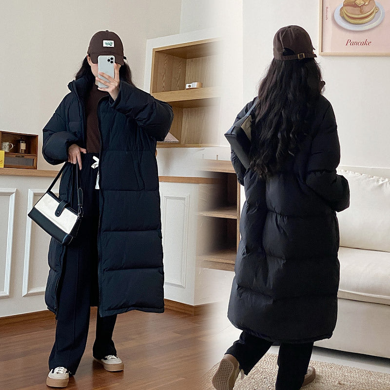 Damen Lange Pufferjacke mit Kapuze und voluminösem Schnitt EB