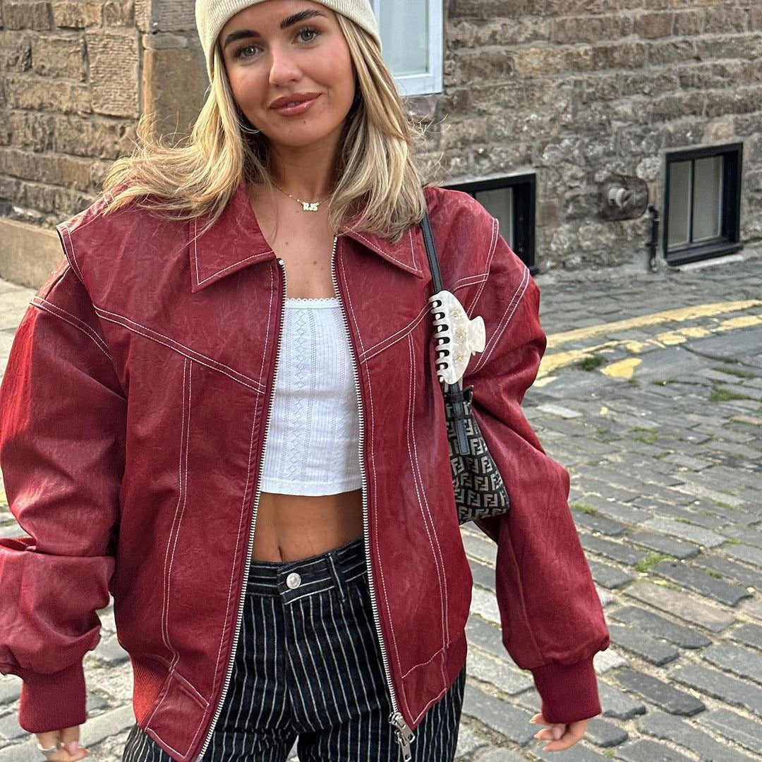 Damen Elegante Kunstlederjacke mit hochstehendem Kragen und elastischen Bündchen EB