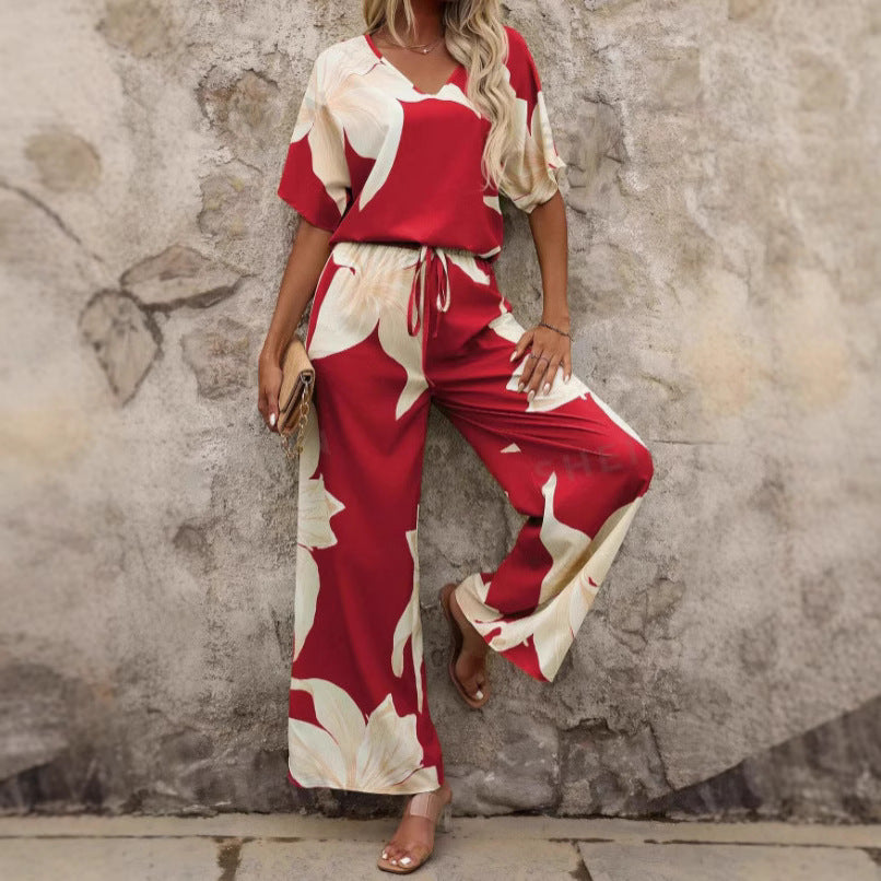 Damen Eleganter Jumpsuit mit floralen Mustern und weitem Bein EB