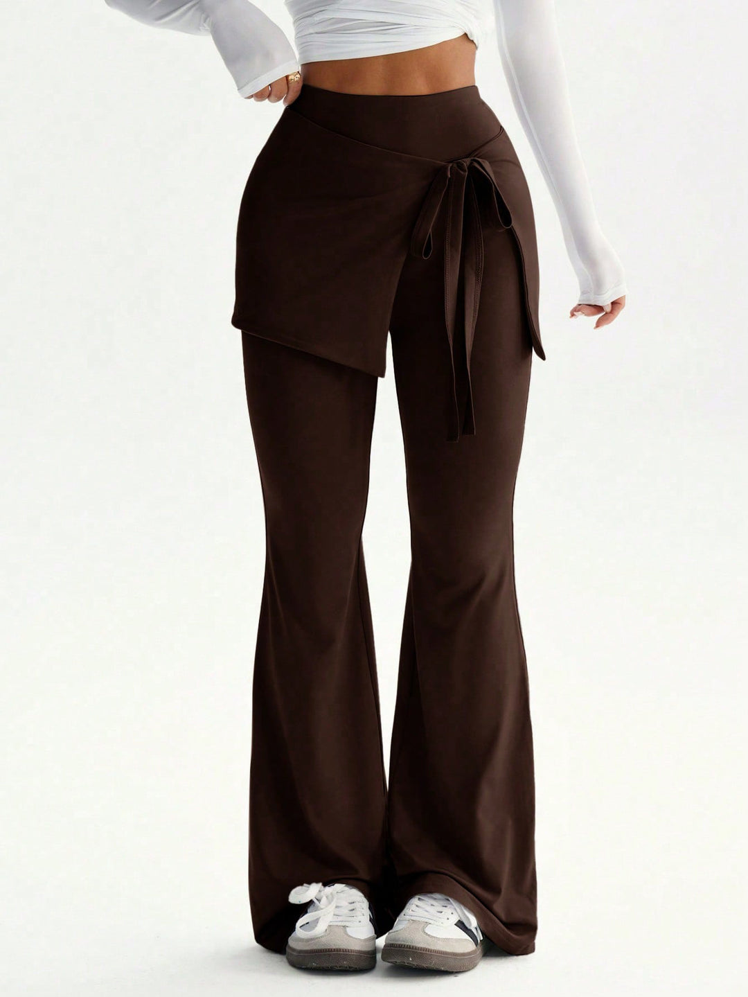 Damen hochtaillierte Schlaghose mit Wickelrock-Overlay und Taillenschleife Eichborn Berlin