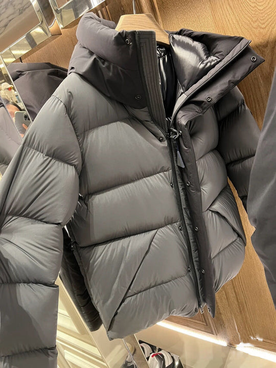 Damen Daunenjacke mit hohem Kragen und praktischen Reißverschlusstaschen EB
