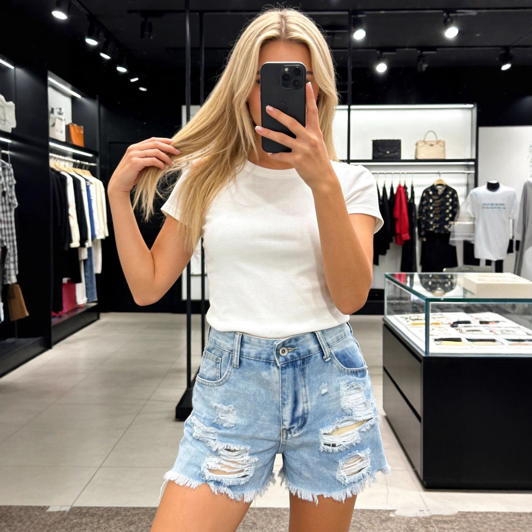 Damen Destroyed Denim-Shorts mit hohen Taschen und fransigem Saum EB