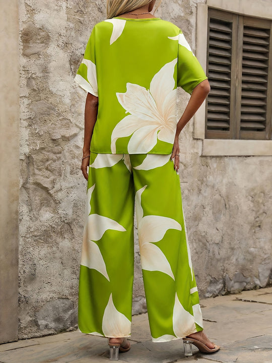 Damen luftiges Ensemble mit fließendem Schnitt und floralem Design EB