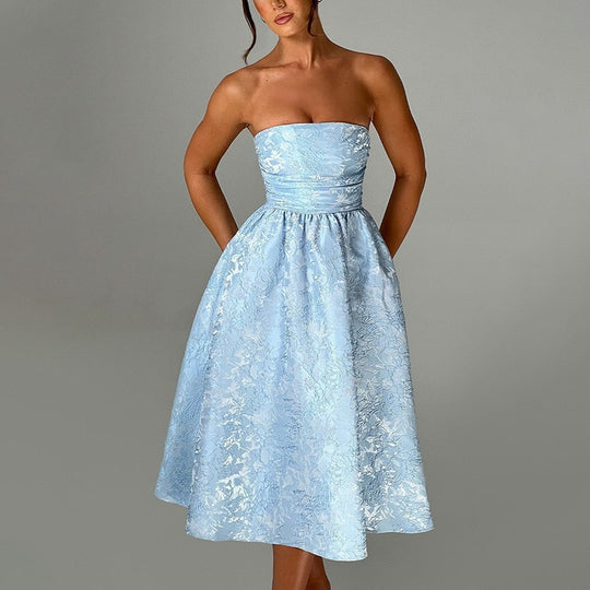 Damen Cocktailkleid mit schimmerndem Stoff und figurbetontem Oberteil EB