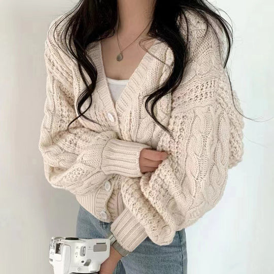 Damen Grobstrickjacke mit voluminösen Ärmeln und einzigartigem Zopfmuster EB
