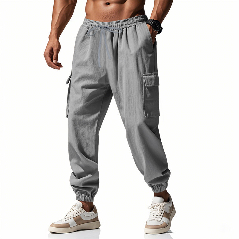 Herren nan konisch zulaufende Jogger im utilitarischen Stil mit elastischem Bund, Kordelzug und Klappentaschen EB