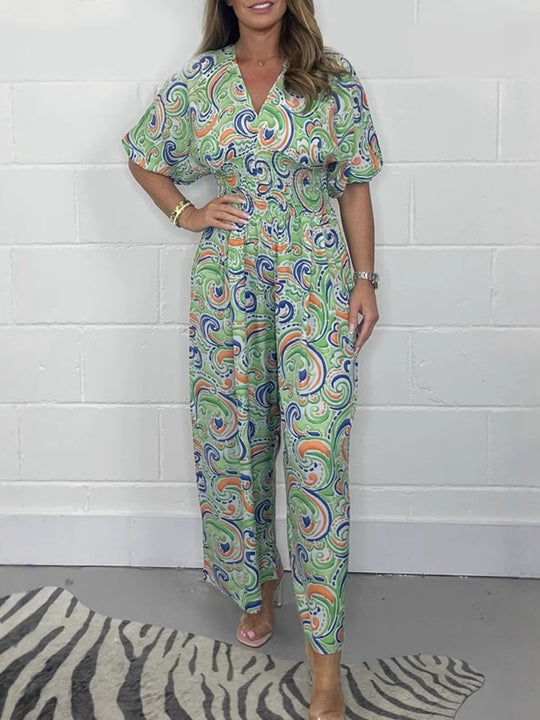 Damen Fließendes Jumpsuit mit elegantem Paisleymuster und Taillierung EB