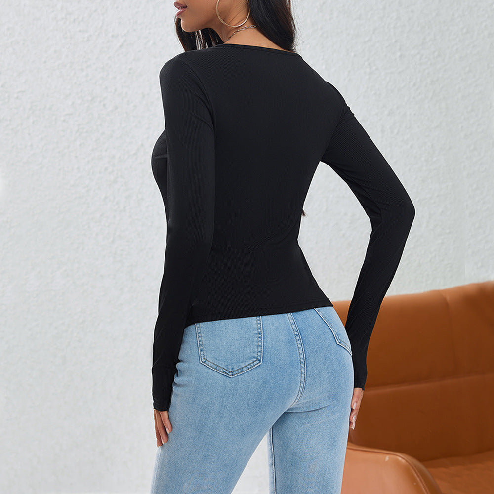Damen asymmetrisches geripptes Longsleeve mit Diagonalknopfleiste und spitzem Saum Eichborn Berlin