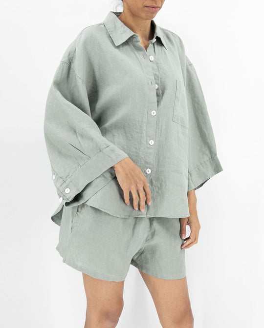 Damen Lässige Leinenbluse mit bequemen Schnitt und praktischen Taschen EB