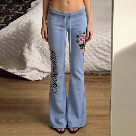 Damen nan ausgestellte Jersey-Sweathose mit Kordelzug, floralem Seitenprint und Statement-Schriftzug EB