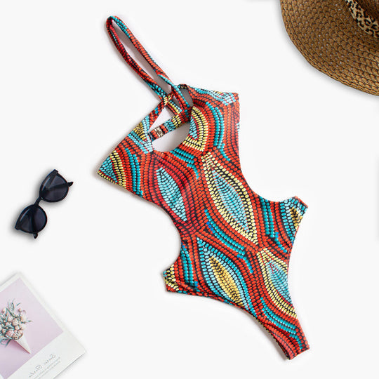 Damen Einteiliger Badeanzug mit asymmetrischem Cut-Out und floralem Design EB