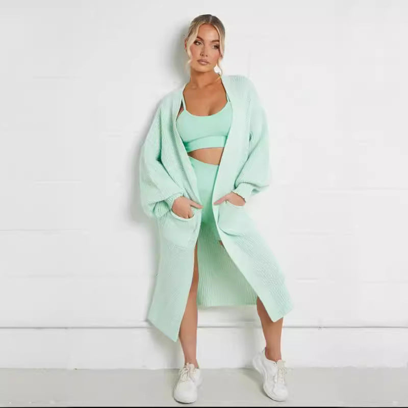Damen Langstrickjacke mit grober Maschenstruktur und praktischen Taschen EB
