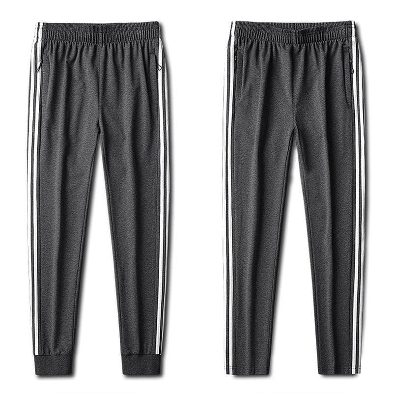 Herren Slim-Fit Trackhose mit seitlichen Kontraststreifen, Reißverschlusstaschen und elastischem Bund EB