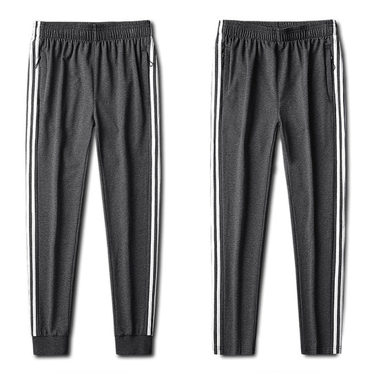 Herren Slim-Fit Trackhose mit seitlichen Kontraststreifen, Reißverschlusstaschen und elastischem Bund EB