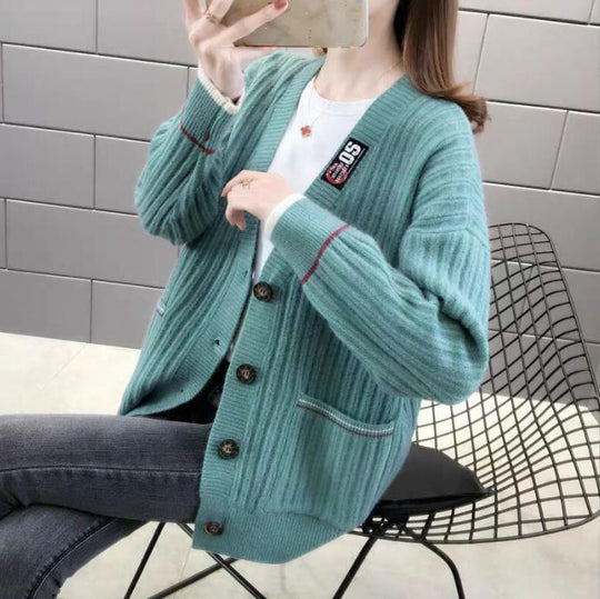 Damen Strickjacke mit strukturiertem Rippmuster und praktischen Taschen EB