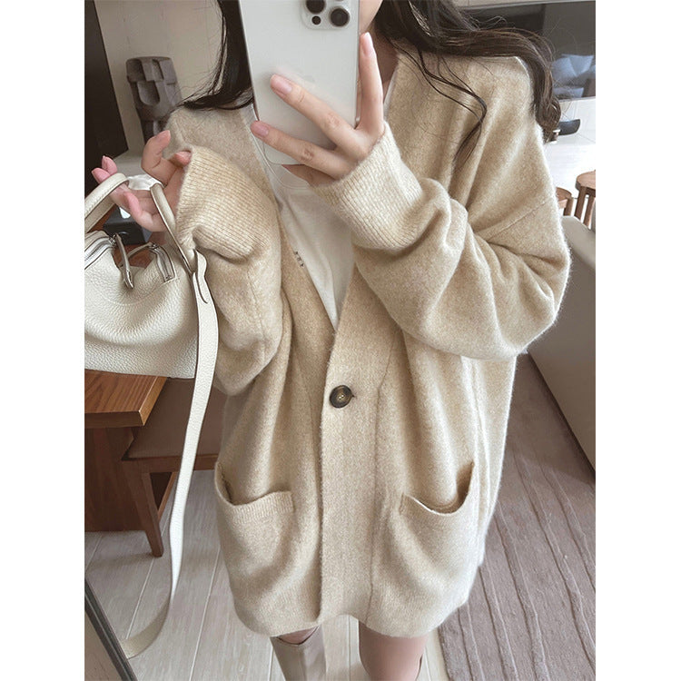 Damen Gemütlicher Strickcardigan mit großen Taschen und asymmetrischem Schnitt EB