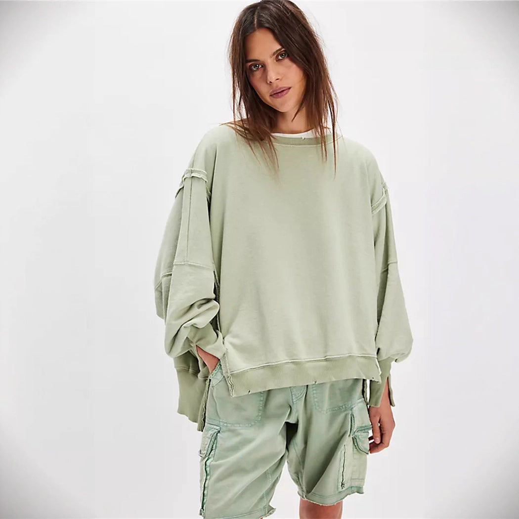 Damen oversized Sweatshirt mit Ballonärmeln, offenen Saumnähten und seitlichen Schlitzen Eichborn Berlin