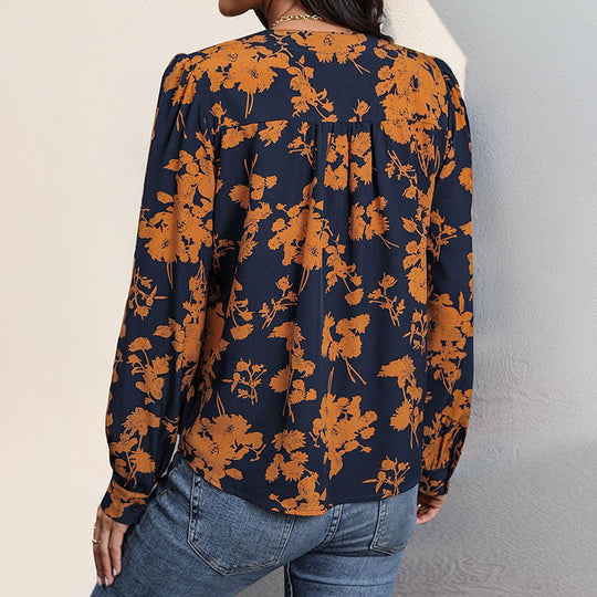 Damen Bluse mit floralem Muster und eleganten Puffärmeln EB