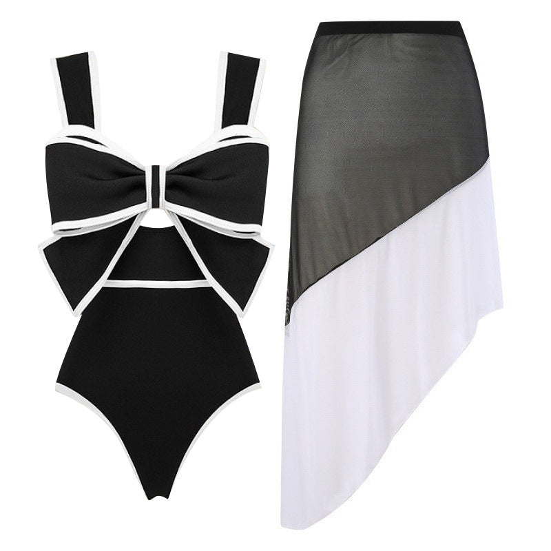 Damen Badeanzug mit modischem Bogen-Design und dazu passendem Rock EB