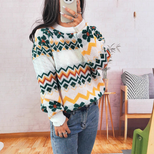 Damen Grobstrickpullover mit buntem Zickzackmuster und floralen Akzenten EB