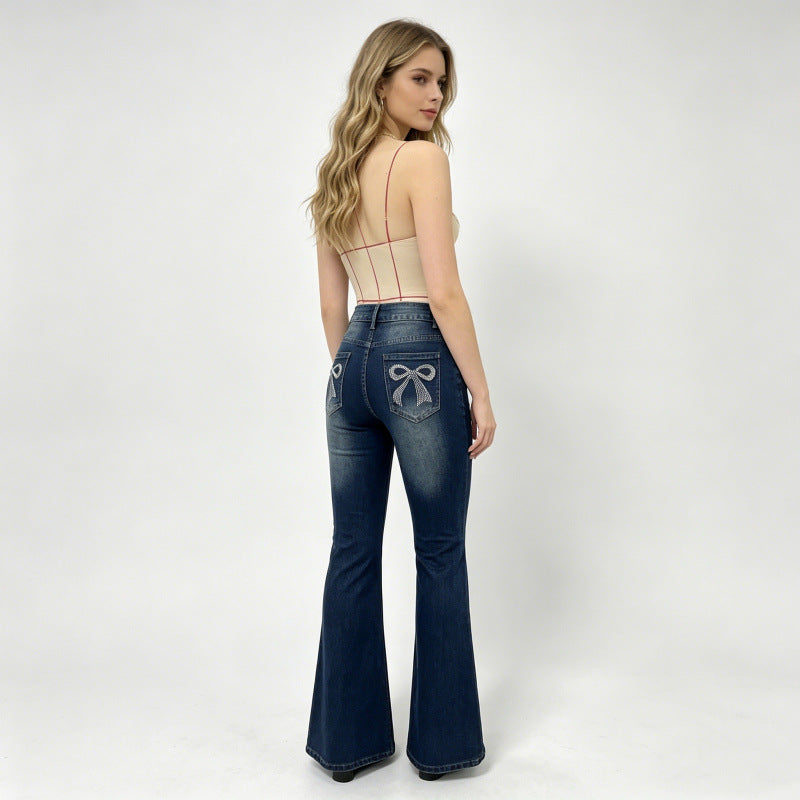 Damen Bootcut Jeans mit dekorativen Stickereien EB