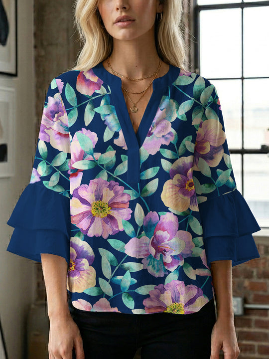 Damen Bluse mit voluminösen Ärmeln und floralem Design EB