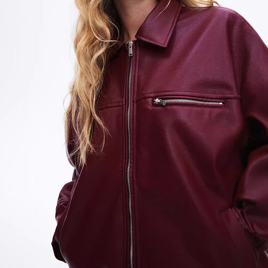 Damen modische Kunstlederjacke mit elastischem Saum und modernem Schnitt EB
